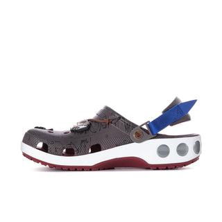 Side view of men's gray clog with blue strap, white sole, and red-brown bottom