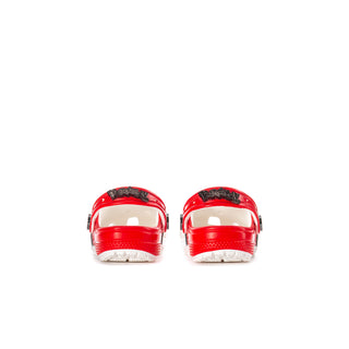 Pair of toddler clogs with red back straps and white perforated sides