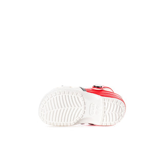 Toddler clogs bottom view with textured white outsole and red heel trim