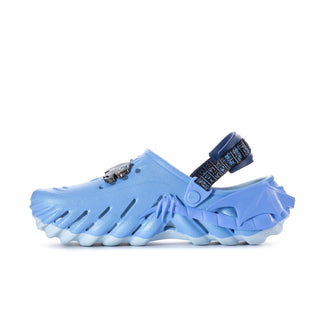 Men's blue clogs with front buckle strap, ridged sole and side emblems
