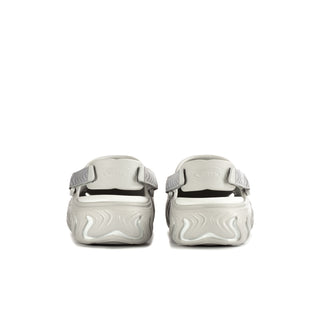 Mens white clogs shown from back, with adjustable heel strap and textured heel