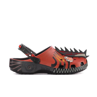 Men's orange graphic clog, black spiked toe detail, and character artwork on the top
