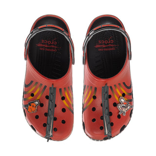 Pair of men's orange clogs showing black interior, vent holes, and character graphics