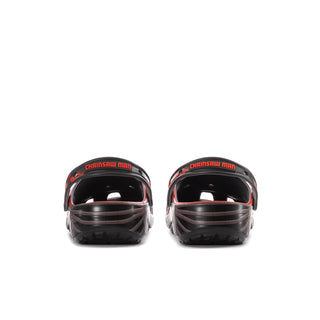 Men's graphic clogs from heel view with black back and red logo markings