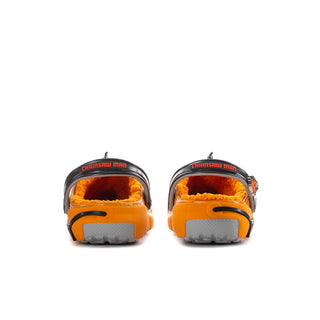 Men's orange clogs, back view with cartoon face, gray straps and CHAINSAW MAN branding