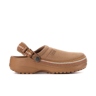Sepia suede women’s clog with decorative whipstitch trim and round buckle detail