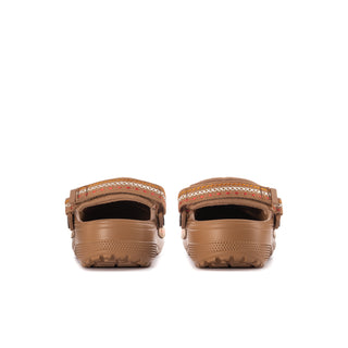 Sepia suede clogs with rear heel openings and textured platform outsole