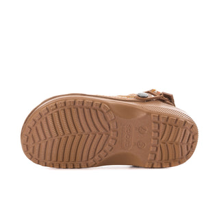 Sepia clog outsole with raised traction tread and center support arch