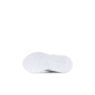 White sneaker outsole with curved tread grooves