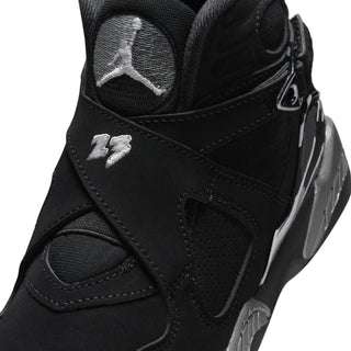 Kids black sneaker upper close-up with Jumpman logo and lace strap details