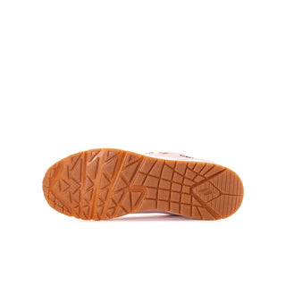 Underside of a youth Skechers Uno Gen1 sneaker showing its textured gum outsole.