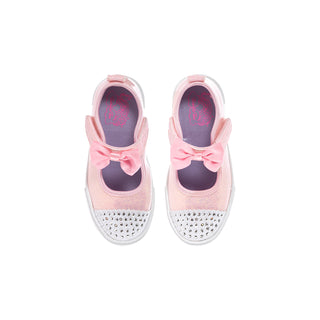 Pair of pink Mary Jane sneakers with bows and studded white toe caps, viewed from above