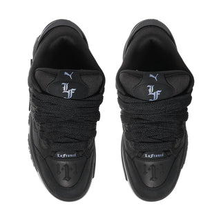 Black skate sneakers, top view with La France heel patch and lace-up collar