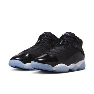 Men's black and blue mid-top sneakers, side view with white/blue sole