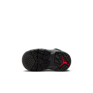 Toddler sneakers outsole view, black rubber tread with red Jumpman logo