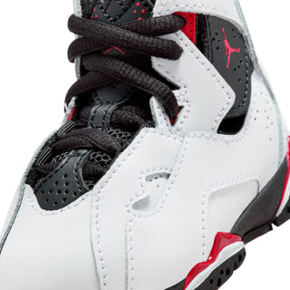 Toddler high-top sneaker close-up: white upper, black lining, red logo accents