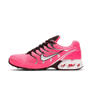 Womens pink Nike Air Max Torch 4 running shoe, black laces, white swoosh and visible air unit