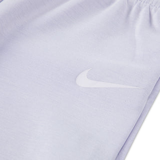 Lilac pants closeup with white Nike swoosh