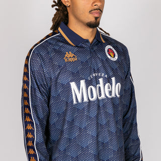 Men's navy long-sleeve jersey with 'Modelo' print and orange side stripe accents