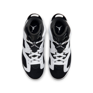 Youth high-top sneakers, black tongue lining and white/black uppers with laces.