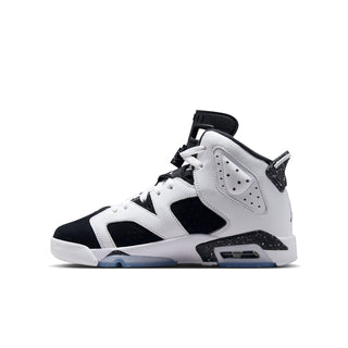 Youth high-top sneakers in white and black with hook-and-loop strap and blue sole.