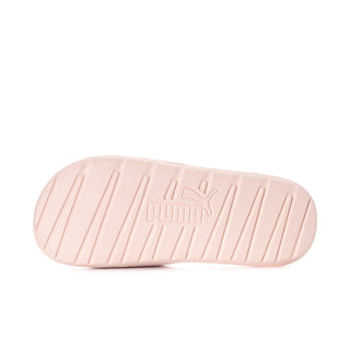 Women's pink slide sandals with textured outsole and Puma logo