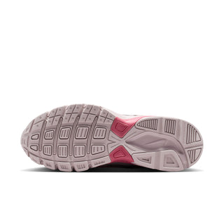 Outsole view of light gray and pink women's sneaker with traction tread