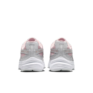 Women's sneakers with white heel counters and light pink uppers, rear view