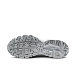 Women's sneakers outsole view with gray tread and white midsole edge