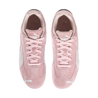 Pink Puma sneakers with lace-up front and suede-look upper, side logo detail