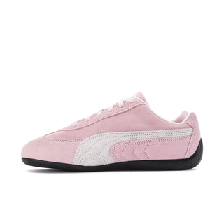 Pink and white Puma sneaker with lace-up top and black rubber sole