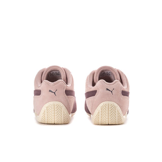 Women's mauve sneakers with Puma heel branding and textured cream outsole