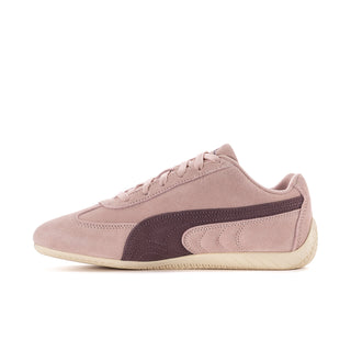 Women's mauve low-top sneakers with dark mauve stripe detail and cream gum sole