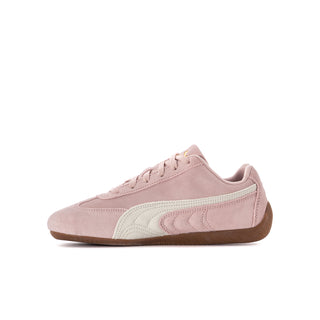 Youth low-top sneakers, side view in mauve suede with white stripe and gum sole