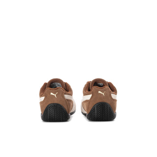 Kids brown lace-up sneakers from the heel, black textured sole and Puma logo