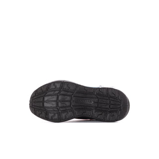 Kids red and black sneaker outsole with textured tread for grip