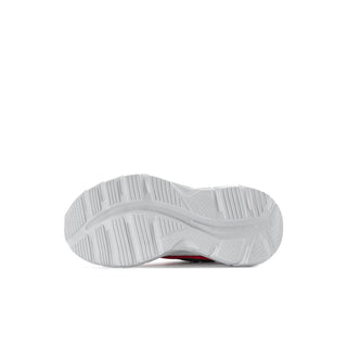 Kids sneaker outsole view with textured gray tread under white midsole