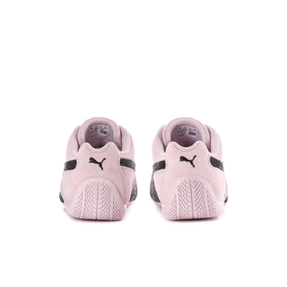 Women’s Puma Speedcat sneakers showing pink heel with black logo accents