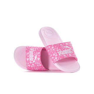 Youth slide sandals with pink graphic strap and molded pink footbed.