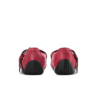 Red mary jane ballet flats from back view with black textured outsole