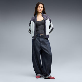 Red mary jane ballet flats on model with dark jeans and rolled cuffs