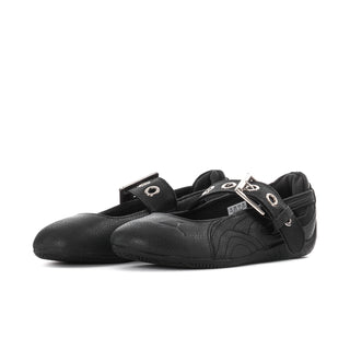 Black ballet flats with ankle strap, silver buckles, and textured toe detail