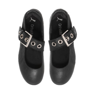 Black ballet flats with silver buckle strap and eyelet detailing, closed toe
