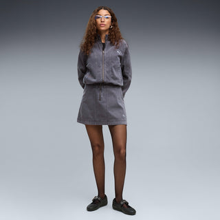 Black ballet flats on model with double-buckle strap and closed-toe design