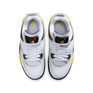 Pair of youth white sneakers with black toe trim and yellow detailing around the edges.