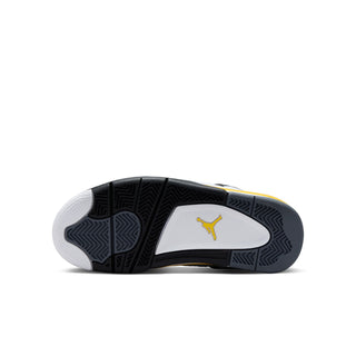 Youth sneaker outsole with dark tread pattern and yellow Jumpman logo on heel.