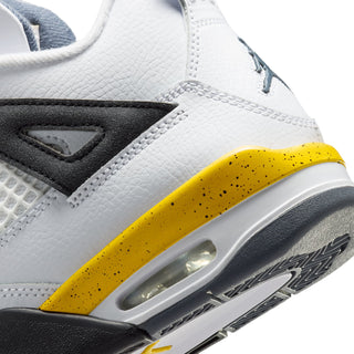 Close-up of youth sneaker side with Air unit, yellow stripe, and black heel panel.