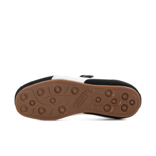 Women's black suede Mary Jane shoe outsole with brown gum tread