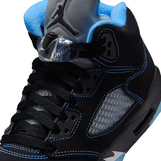 Air Jordan 5 youth close-up, black upper with blue accents and Jumpman ankle graphic