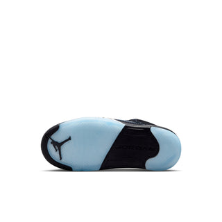 Kids' sneaker outsole with blue tread and Jumpman logo detail